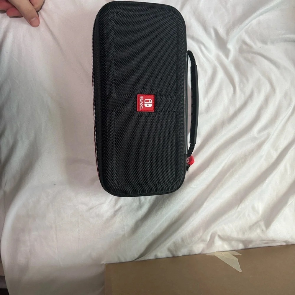 Nintendo Switch with Neon Blue and Red Joy-Con